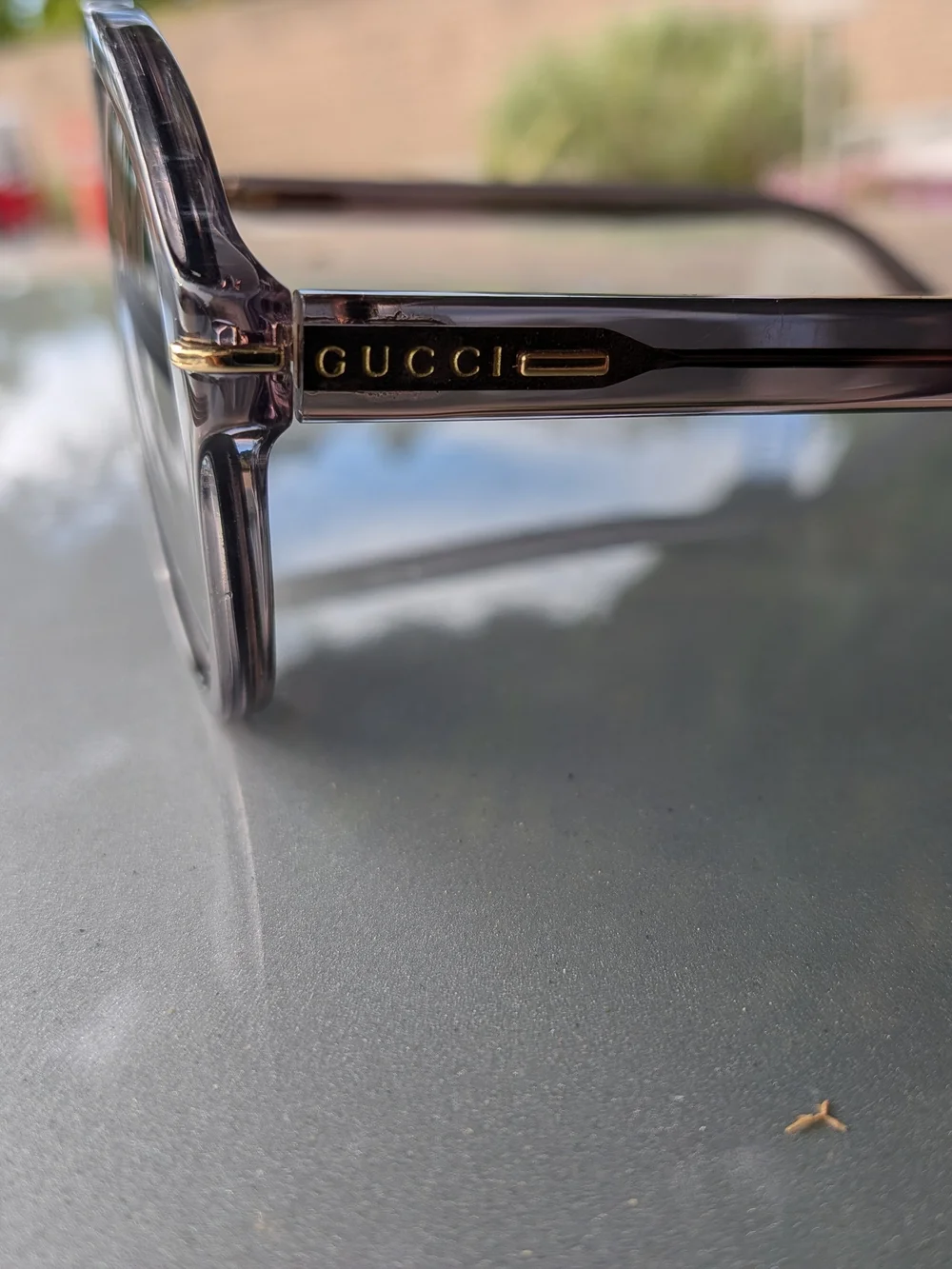 Gucci Men's Translucent Gray Aviator Sunglasses with Dark Lenses